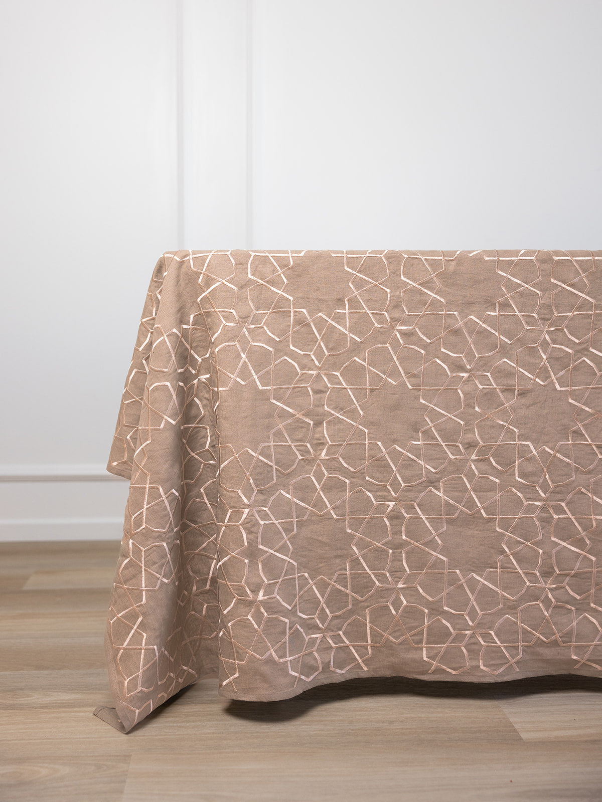 neutral beige linen tablecloth geometric islamic design dining table setup